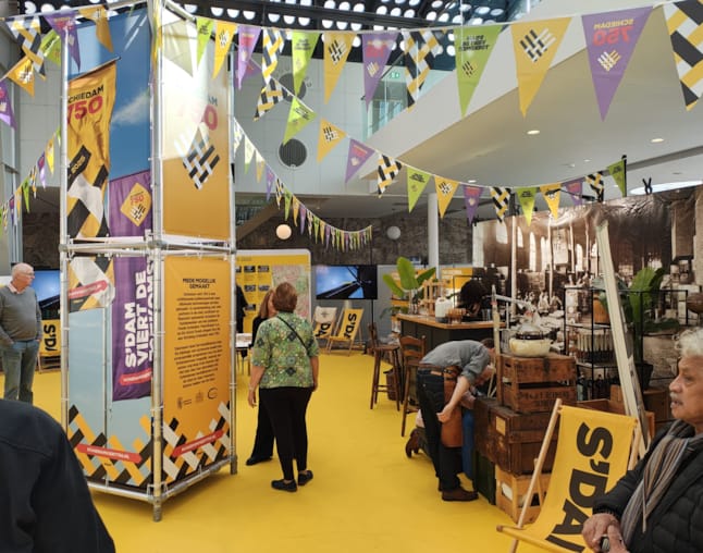 S'DAM OP DE WOONBEURS